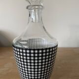 Small black and white checkered carafe with original glass stopper