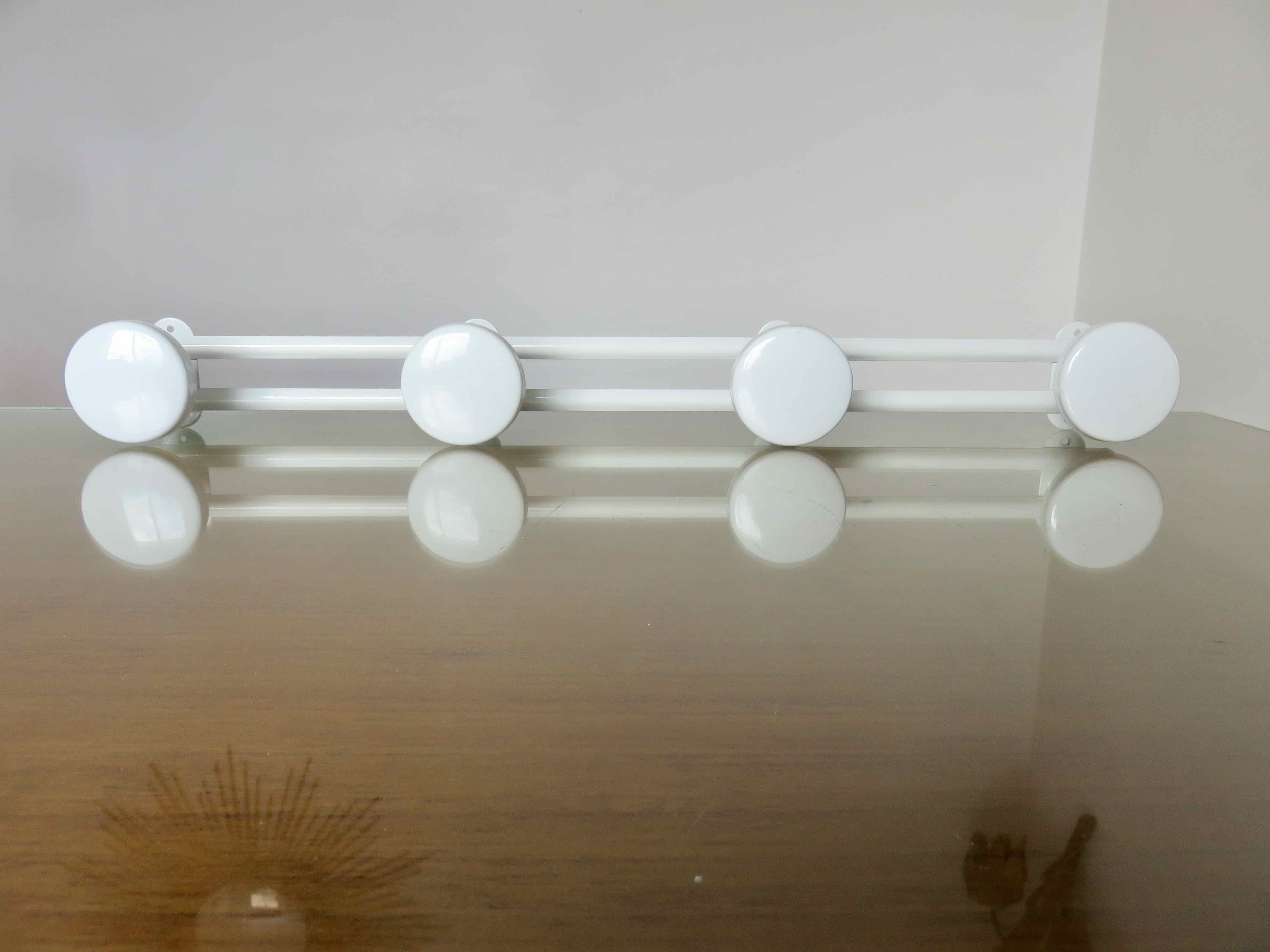 Coat rack in white lacquered metal 70s
