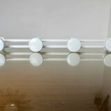 Coat rack in white lacquered metal 70s