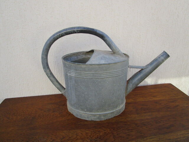 Old zinc watering can