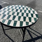 Round coffee table in green and white zellige – handcrafted Moroccan.