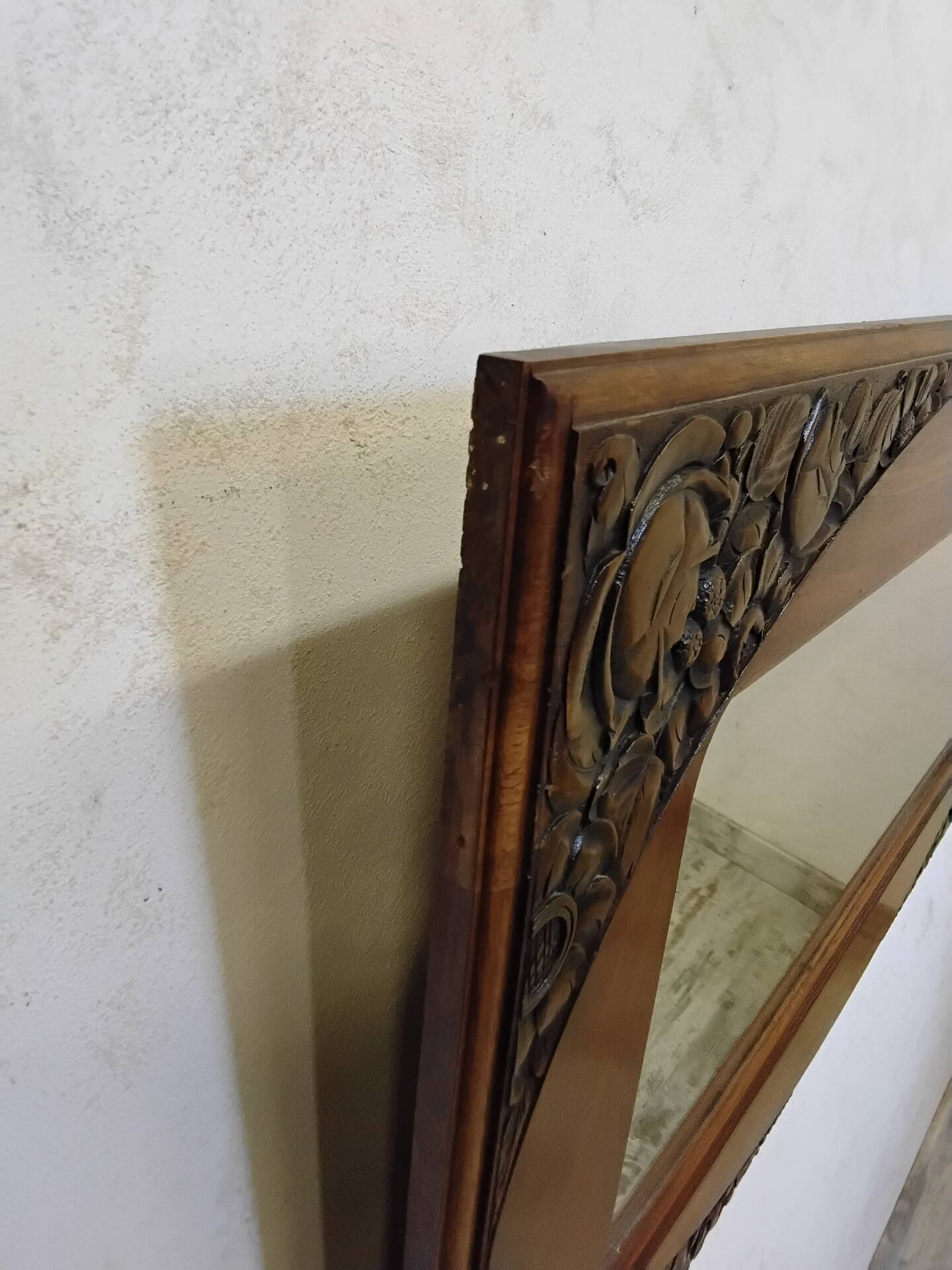 Art Deco mirror with a wooden frame