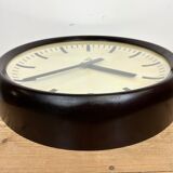 Industrial bakelite factory wall clock from Pragotron, 1960s