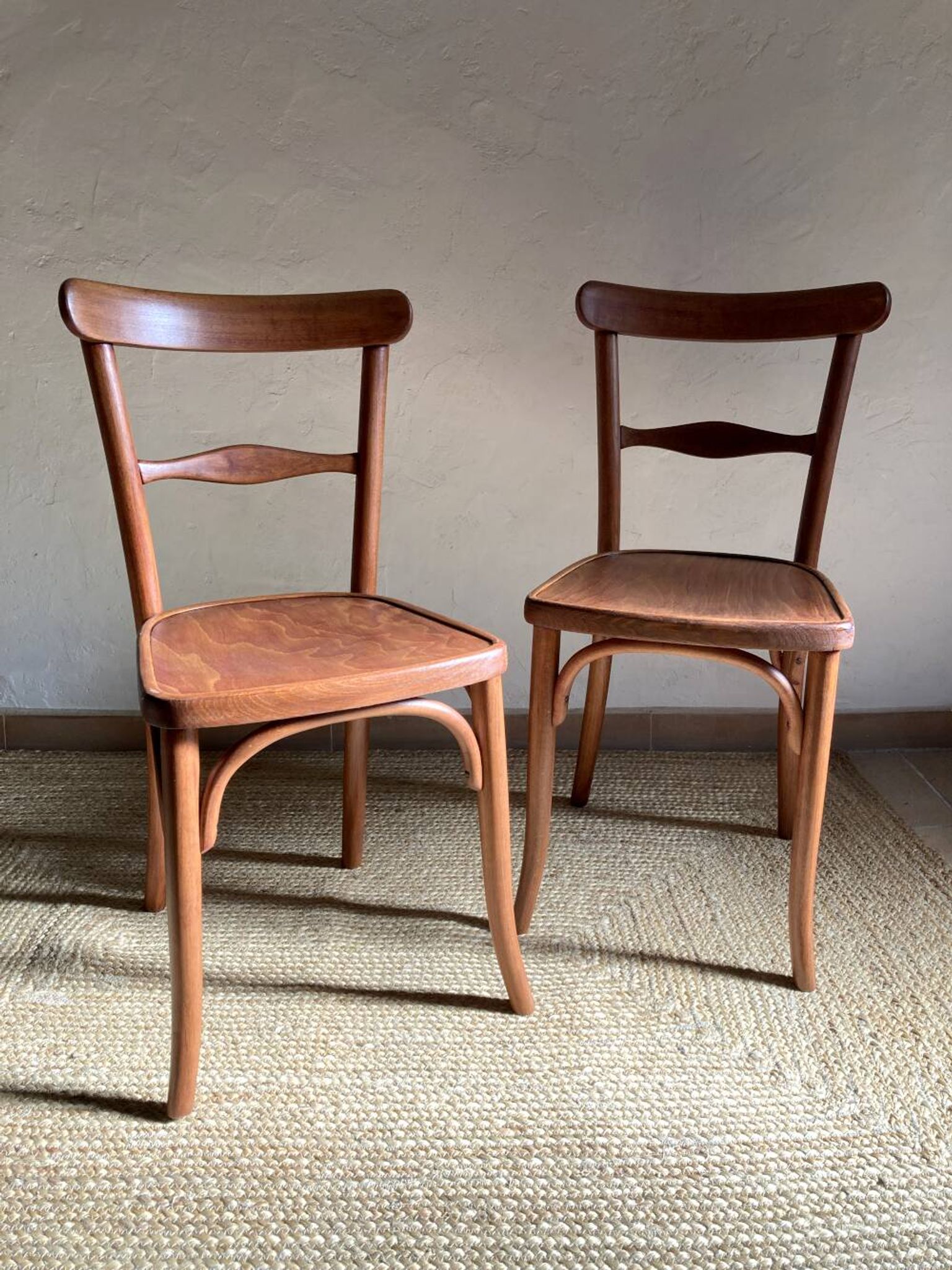 Pair of wooden bistro chairs signed Thonet, 1940s