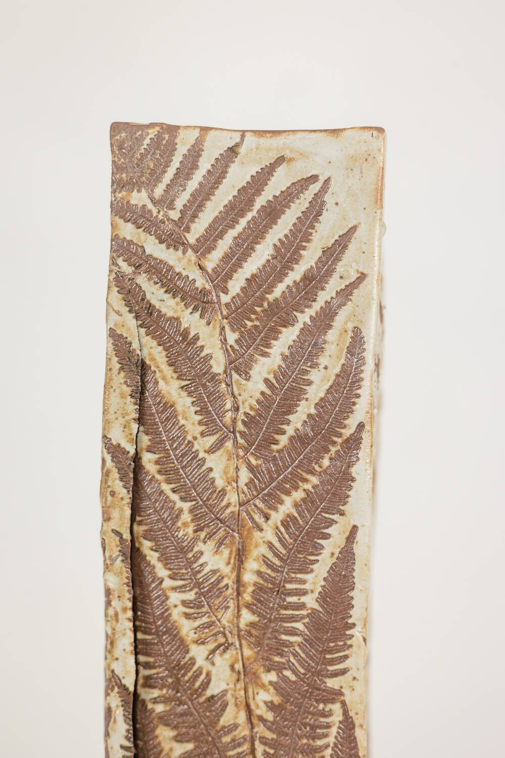 Brutalist stoneware vase with a floral decoration. 1970s.