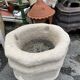 Ancient stone holy water font