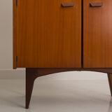 Teak sideboard consisting of a showcase with shelves and a double door