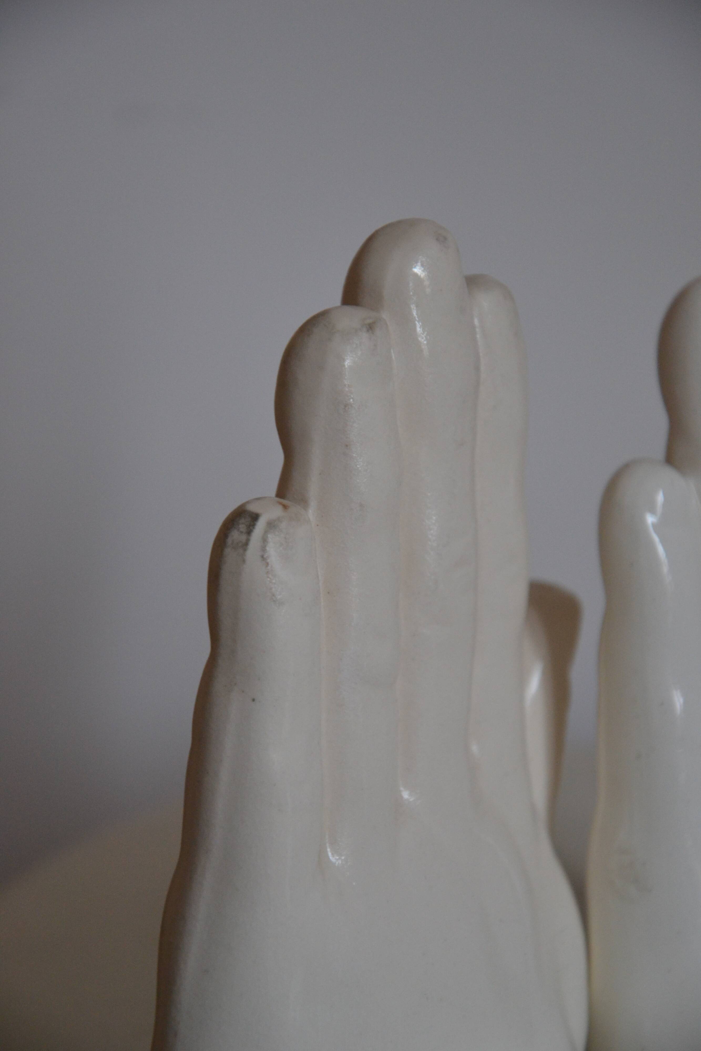 Handends in the shape of vintage white ceramic