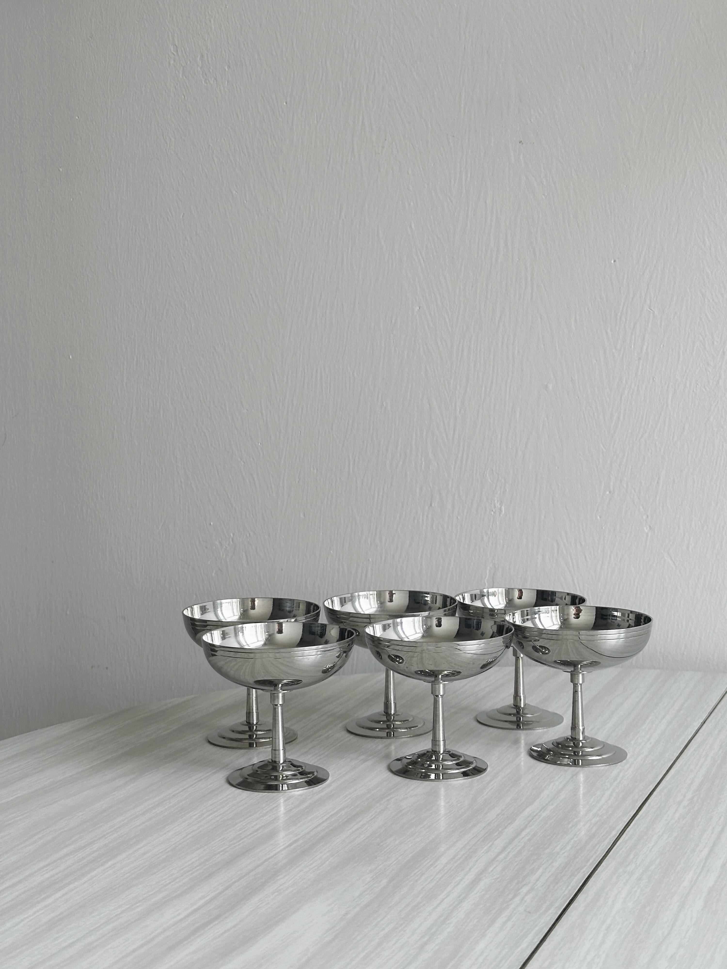 6 Letang Remy shiny stainless steel footed bowls.