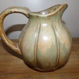 Pitcher in sandstone