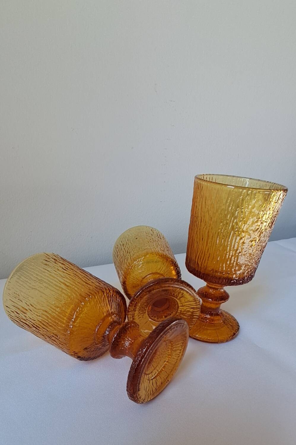 3 textured amber stemmed glasses. Vintage.