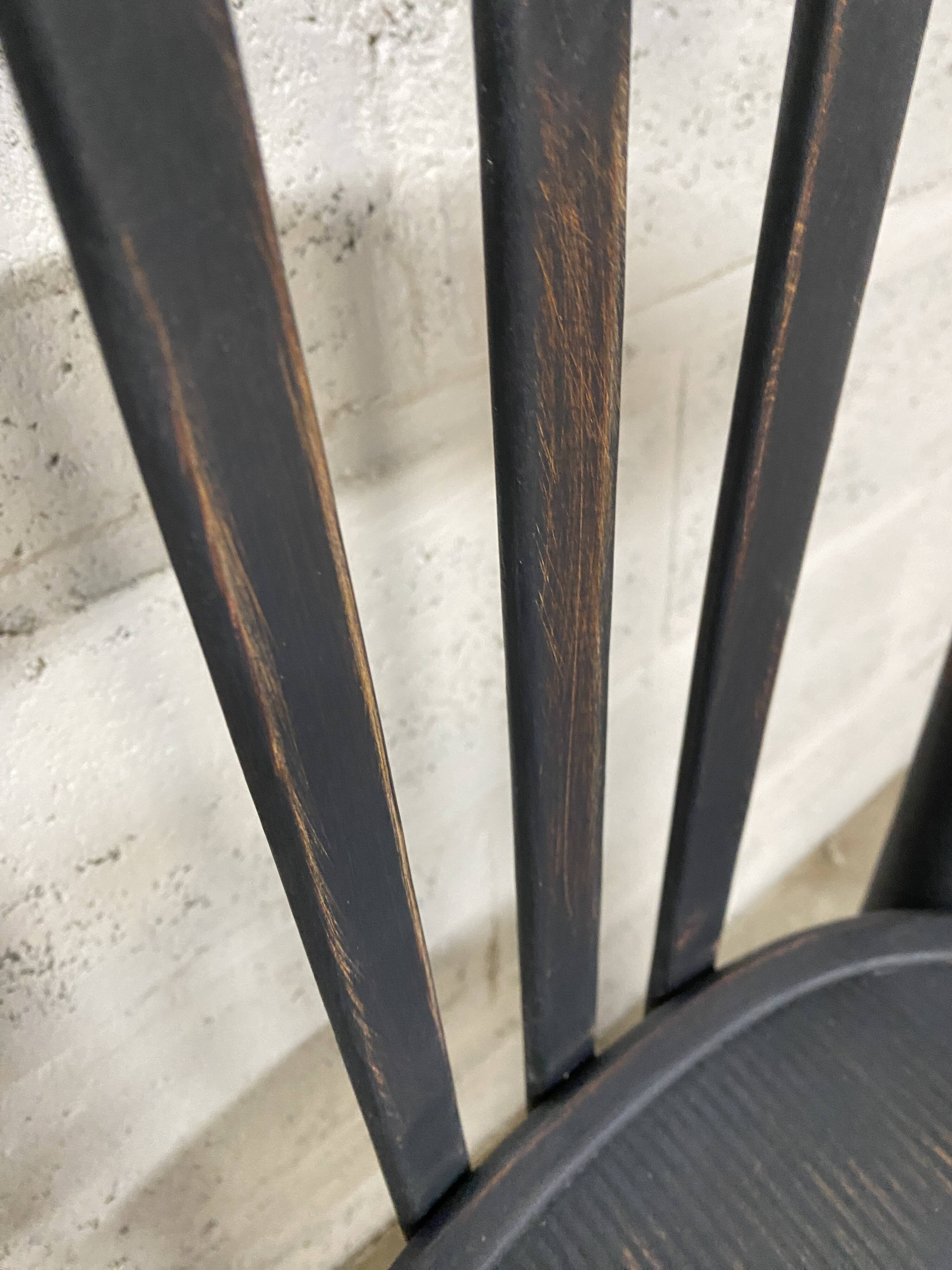 matte black bistro chair with a patina
