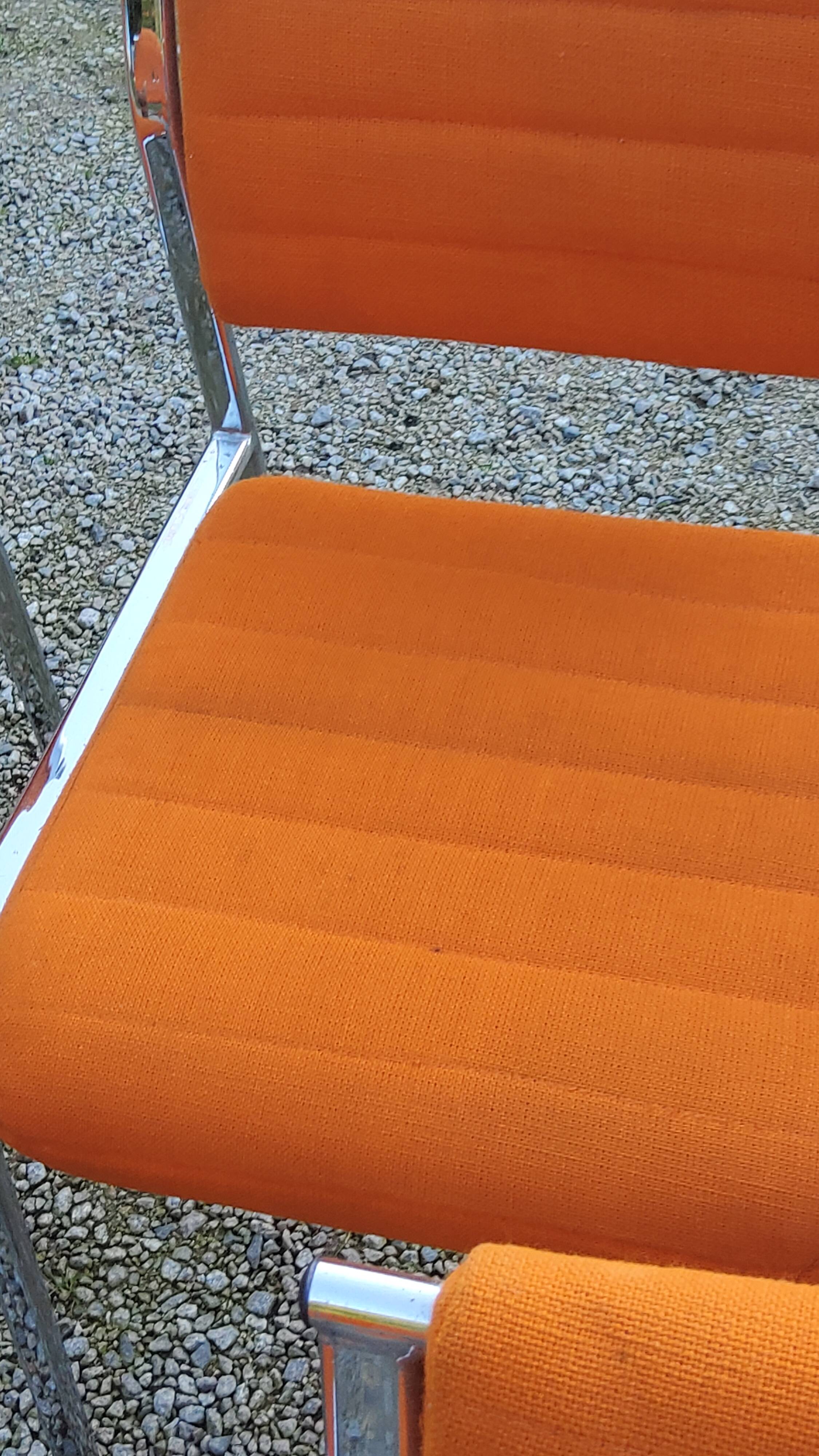 Set of 6 designer chairs from the 70s orange fabrics and chrome tubes