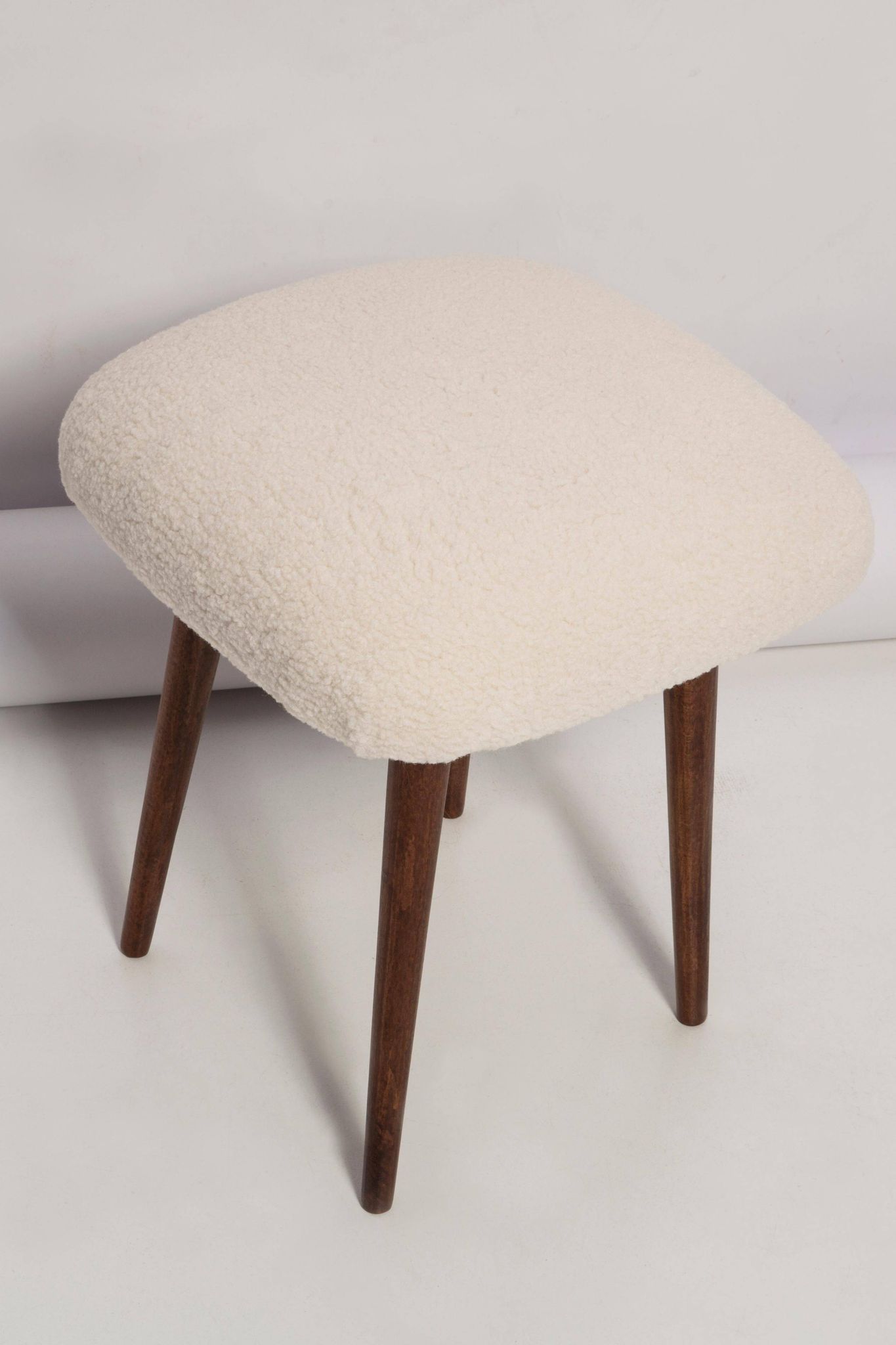Set of two mid-century modern light beige boucle stools, Europe, 1960s.