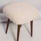 Set of two mid-century modern light beige boucle stools, Europe, 1960s.