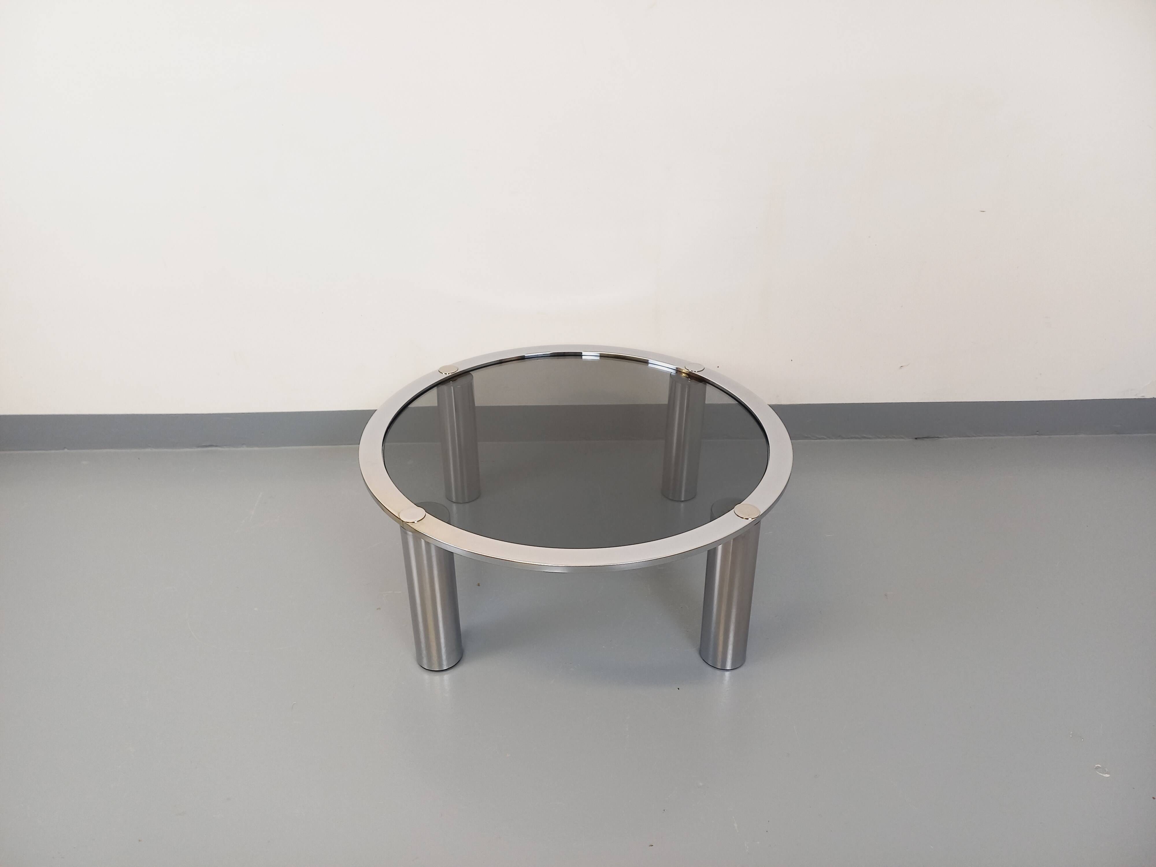 Vintage round coffee table in smoked glass and chrome metal from the 70s