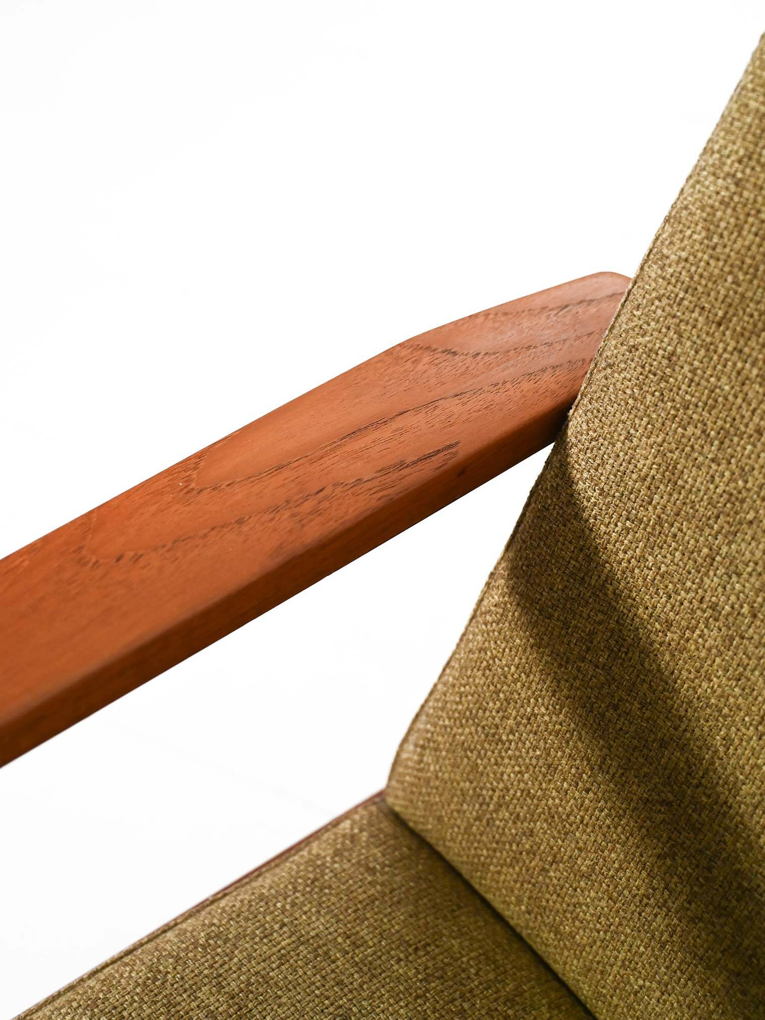 Pair of Danish teak armchairs with green upholstery