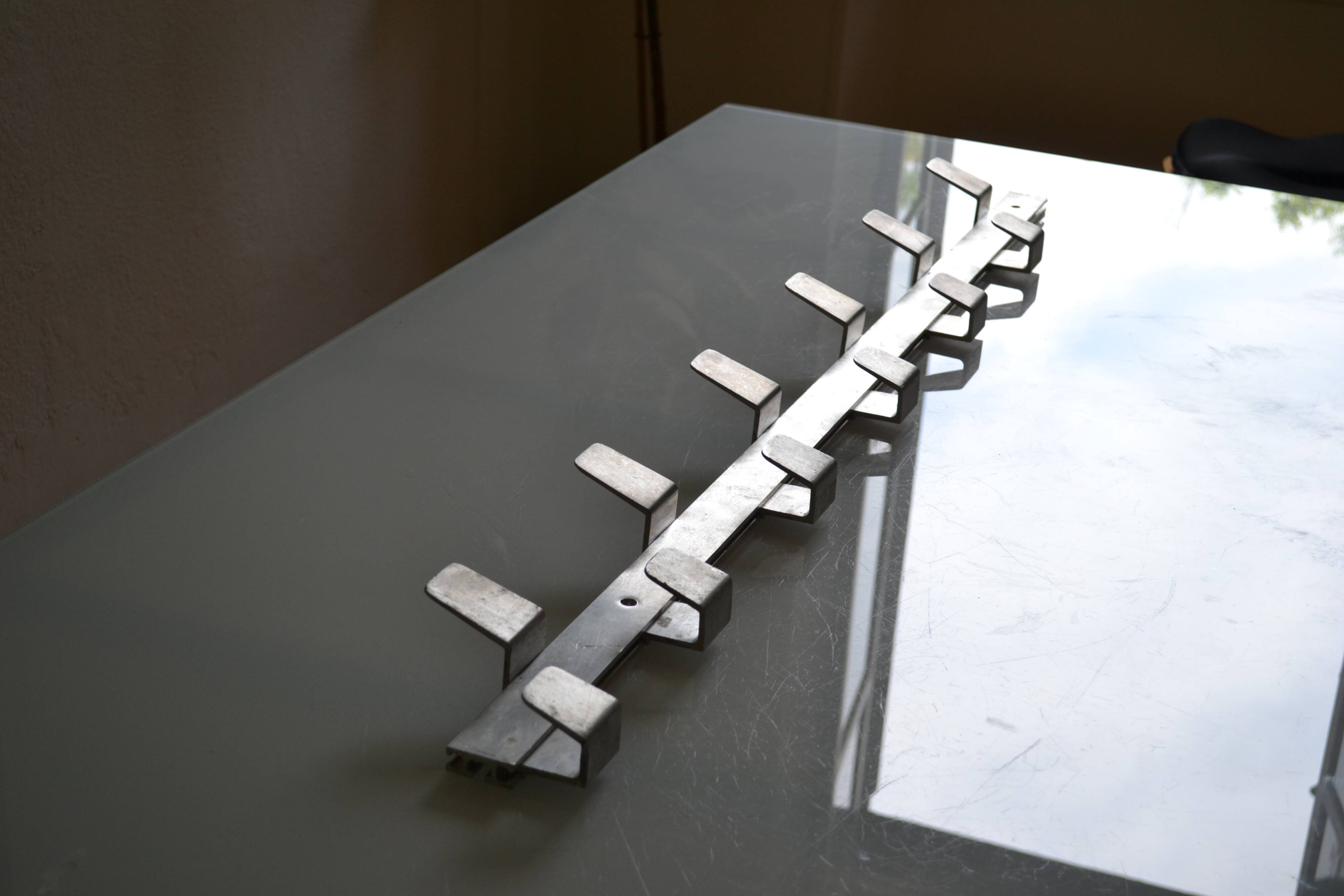 Vintage 70s brushed aluminum metal 12-hook wall coat rack