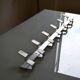 Vintage 70s brushed aluminum metal 12-hook wall coat rack