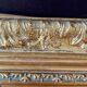Old gilded molded wood frame
