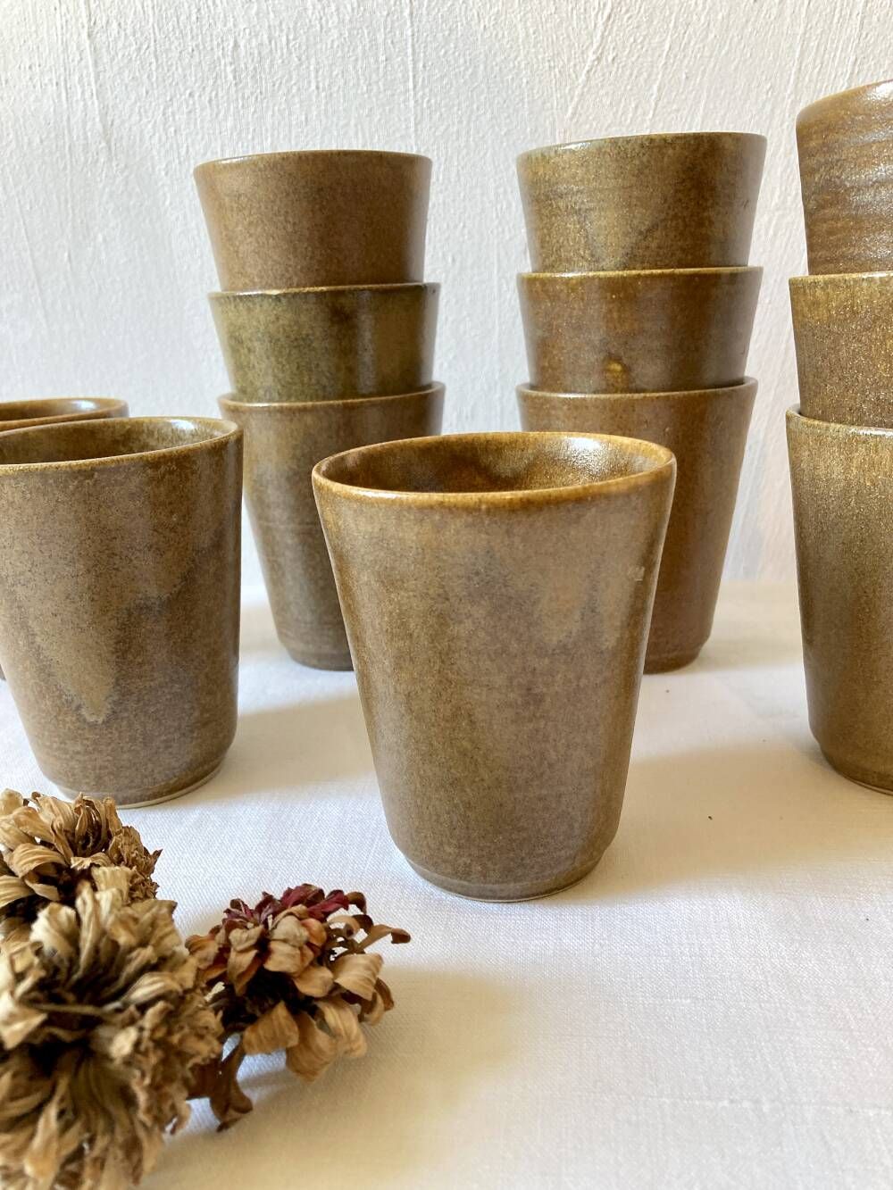 Set of 12 glazed stoneware cups, Digoin Stoneware Pots