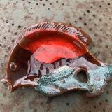 Empty pocket in glazed ceramic slip in the shape of vintage fish