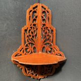Old wall corner shelf in cut wood from the 1900s