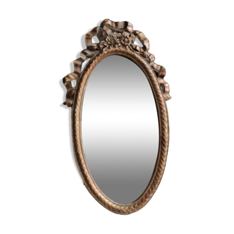 Oval table mirror Louis XVI style, Rococo. Ribboned knots, floral motifs