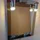 Vintage mirror with sconces.
