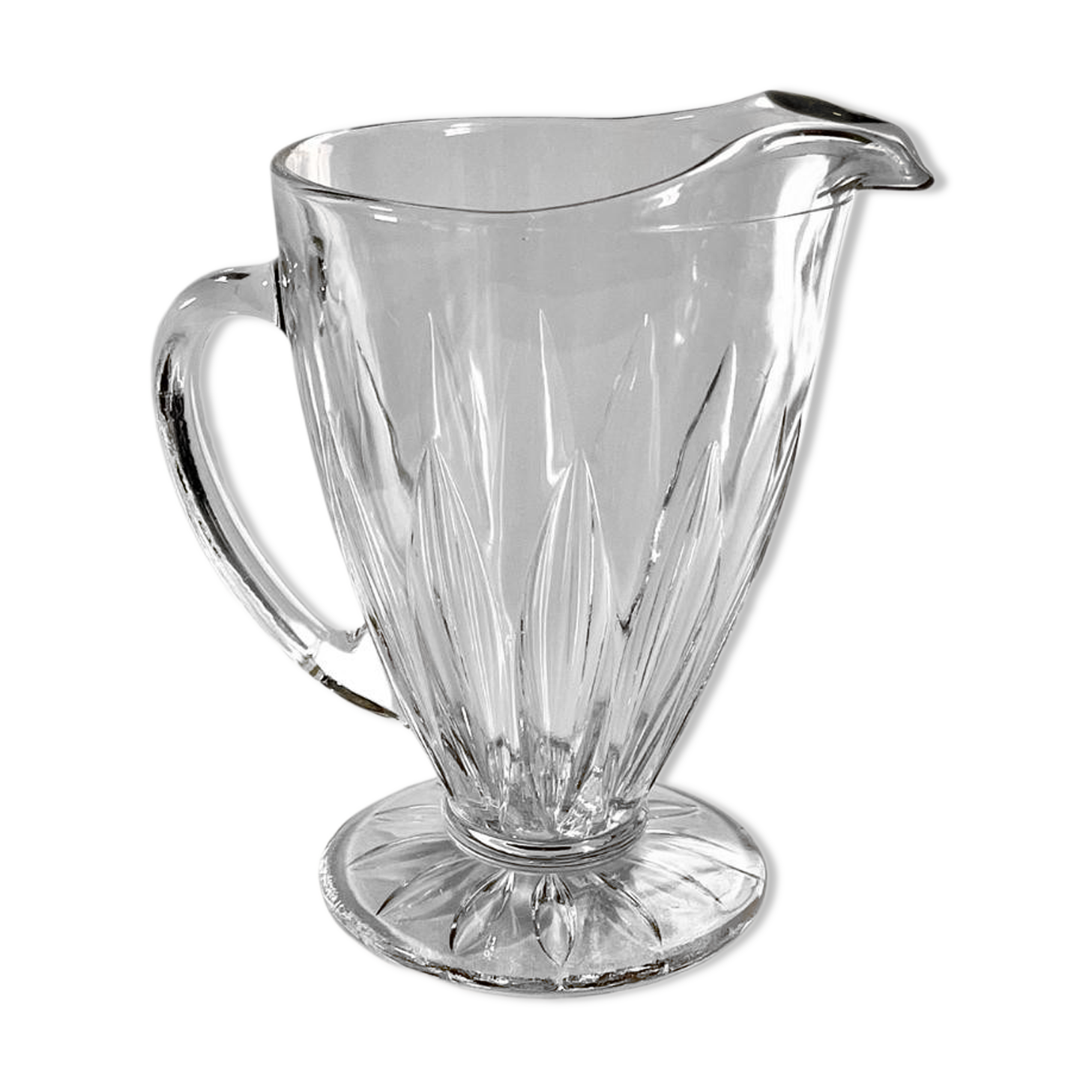 Glass pitcher on base