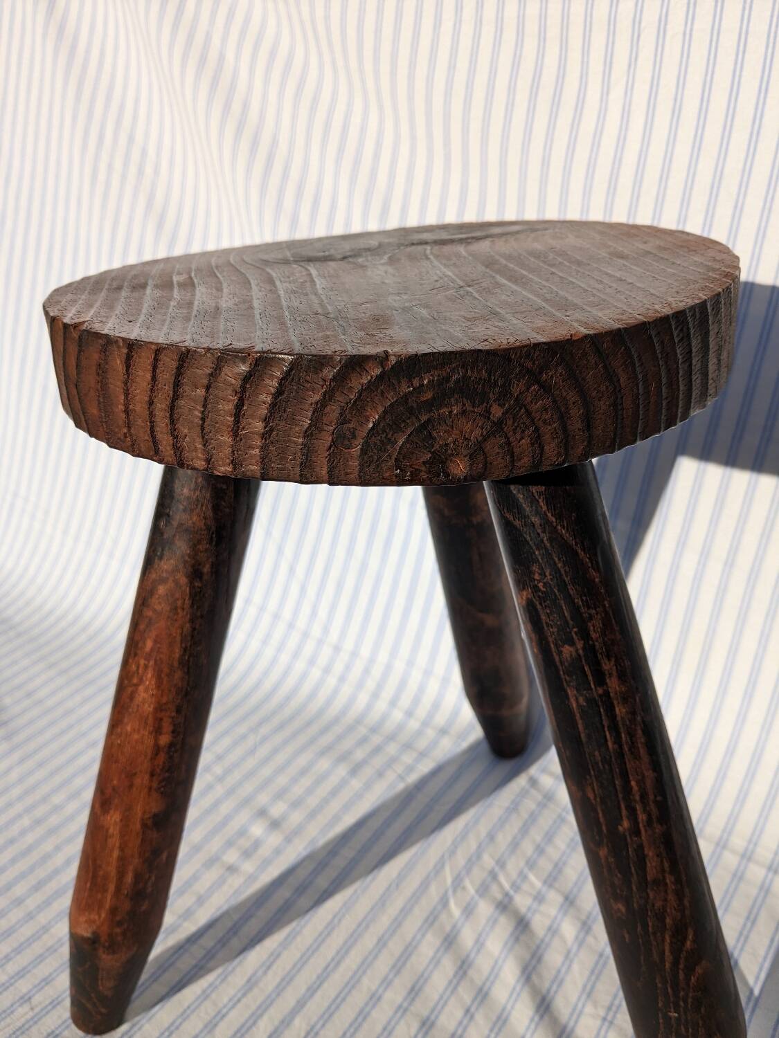Wooden tripod stool