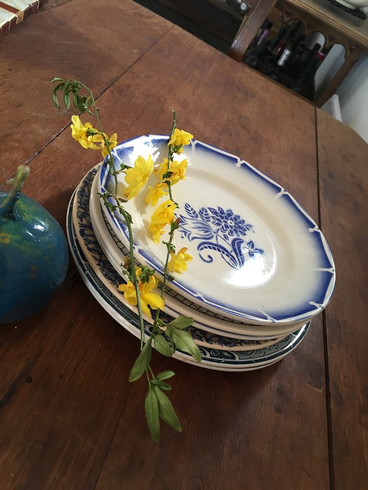 Together seven dessert plates mismatched in blue.