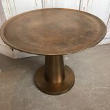Gold-colored large round metal table