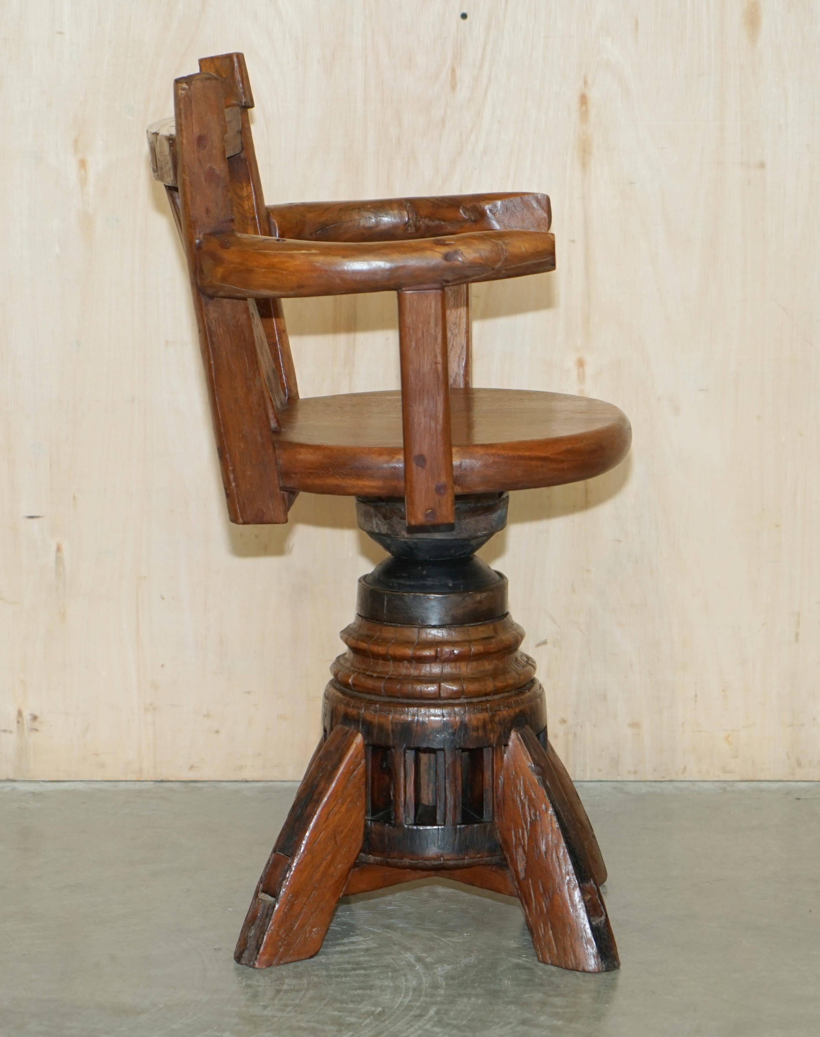 Antique captain's swivel chair on a draft horse wheel from around 1760.