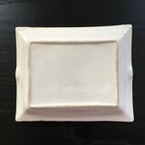 Empty green pocket and ivory