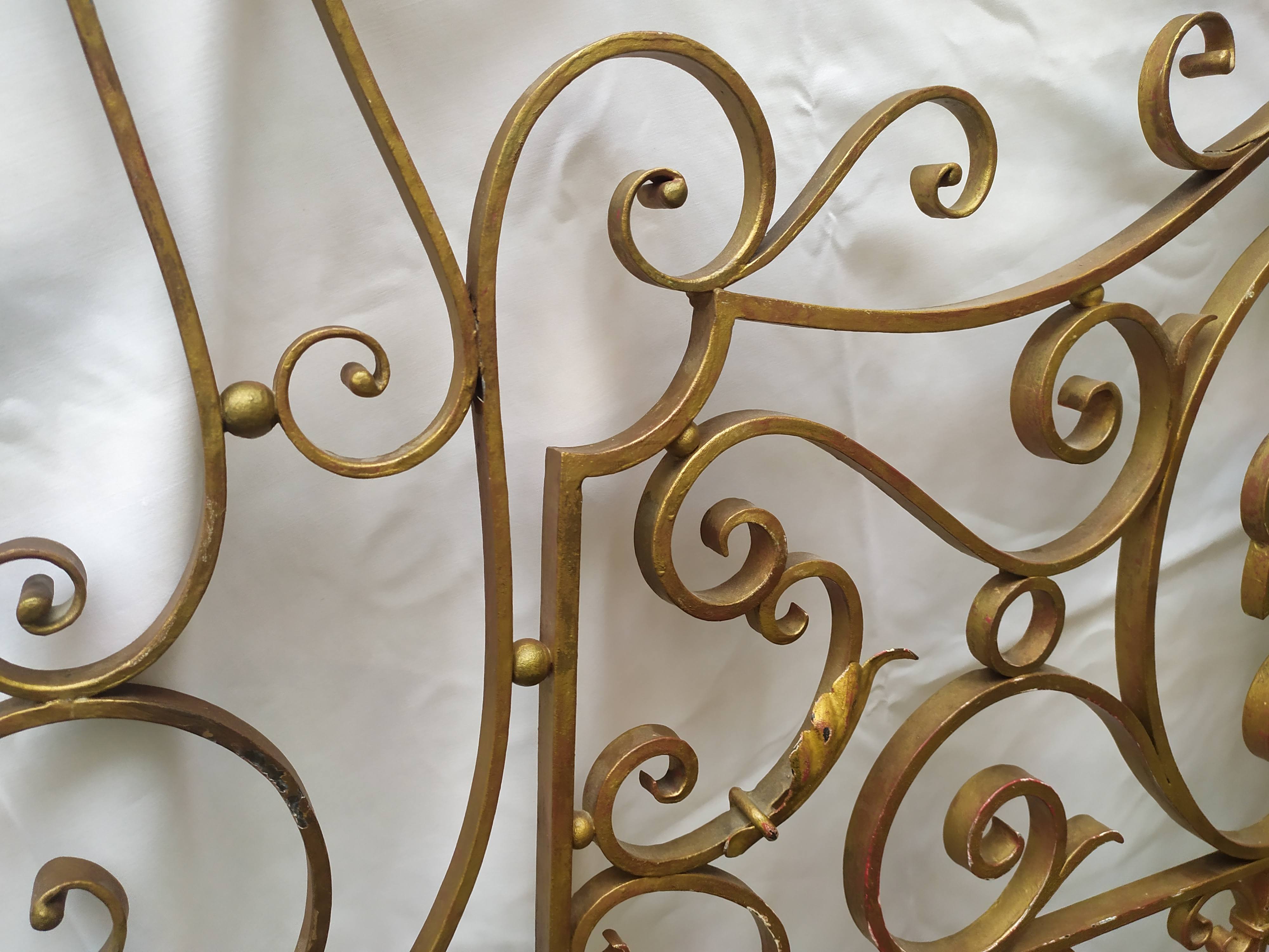 Golden wrought iron bedhead