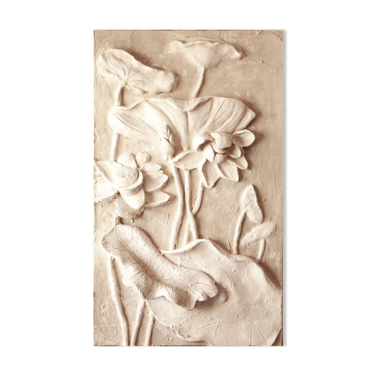 Relief with flowers. Bas-relief with flowers. Relief with flowers. Flowers in relief.
