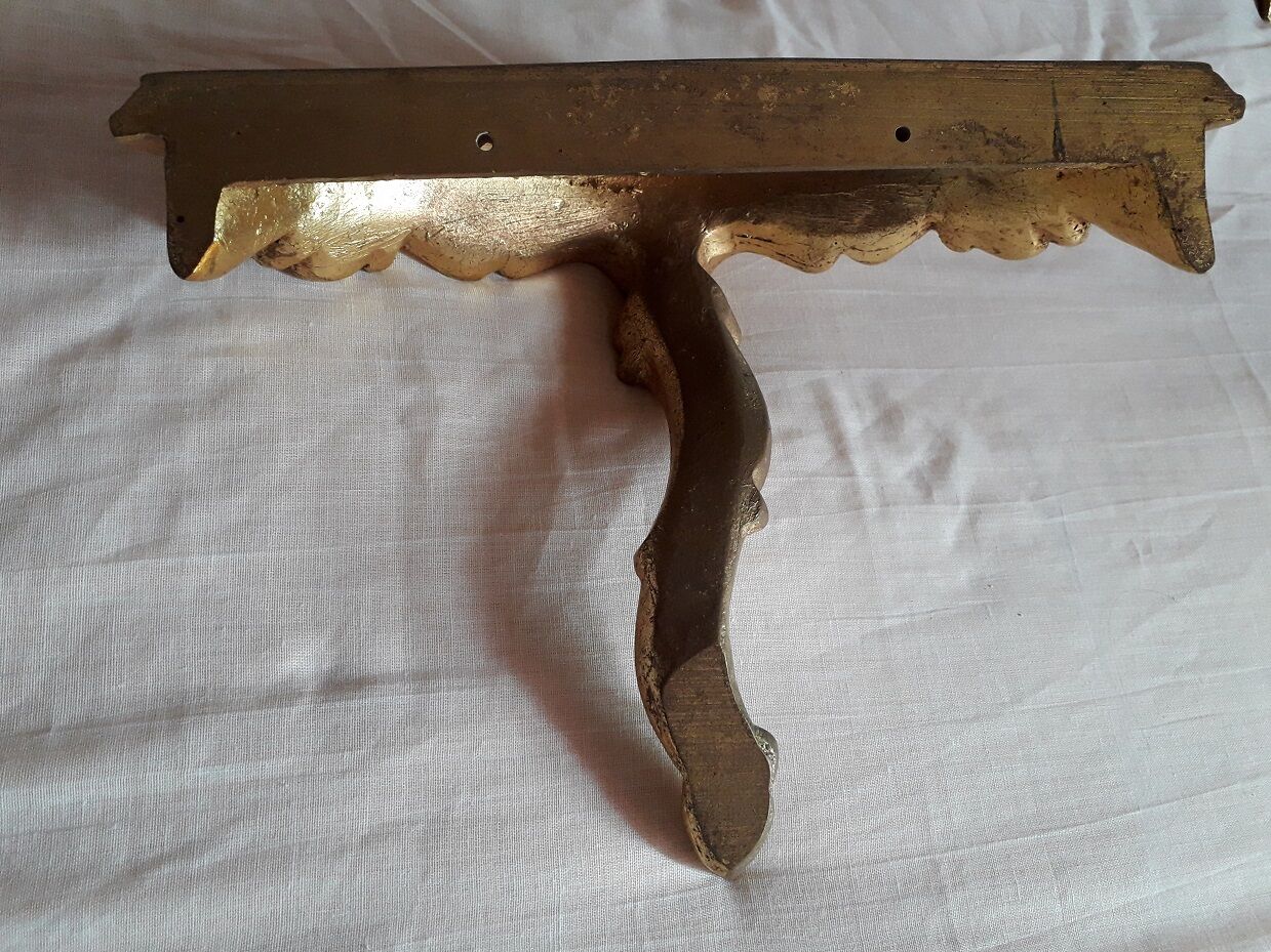 2 small golden wall shelves