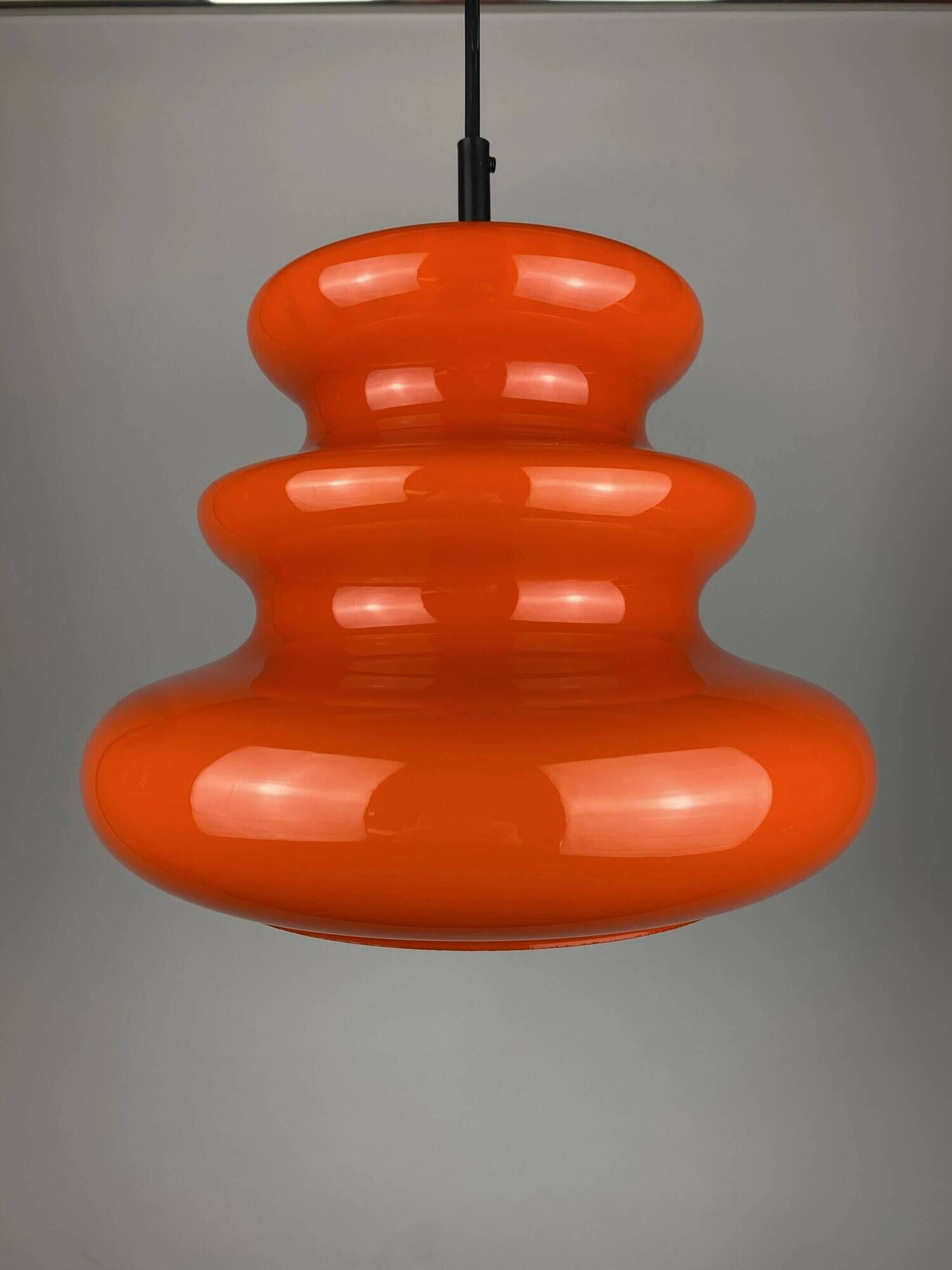 Bright orange glass pendant light AH 1 by Peill and Putzler 1960
