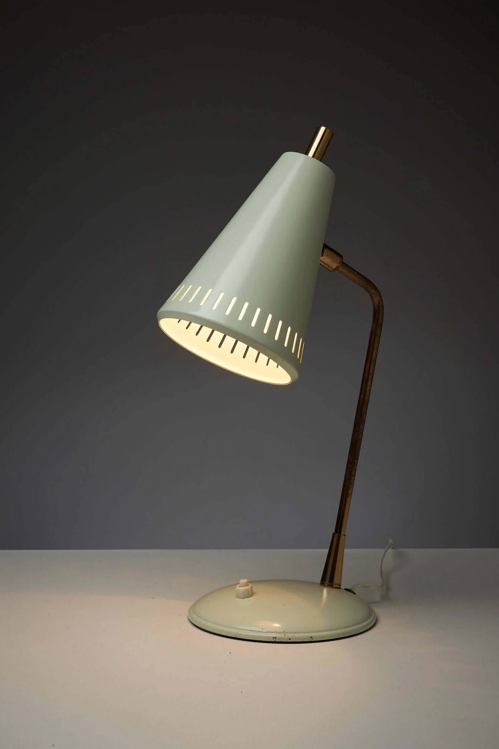 Adjustable table lamp in patinated brass and green metal