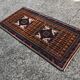 Vintage Persian Baluch rug, hand-knotted wool, 1970.