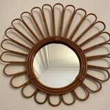 Old vintage asymmetrical round rattan mirror