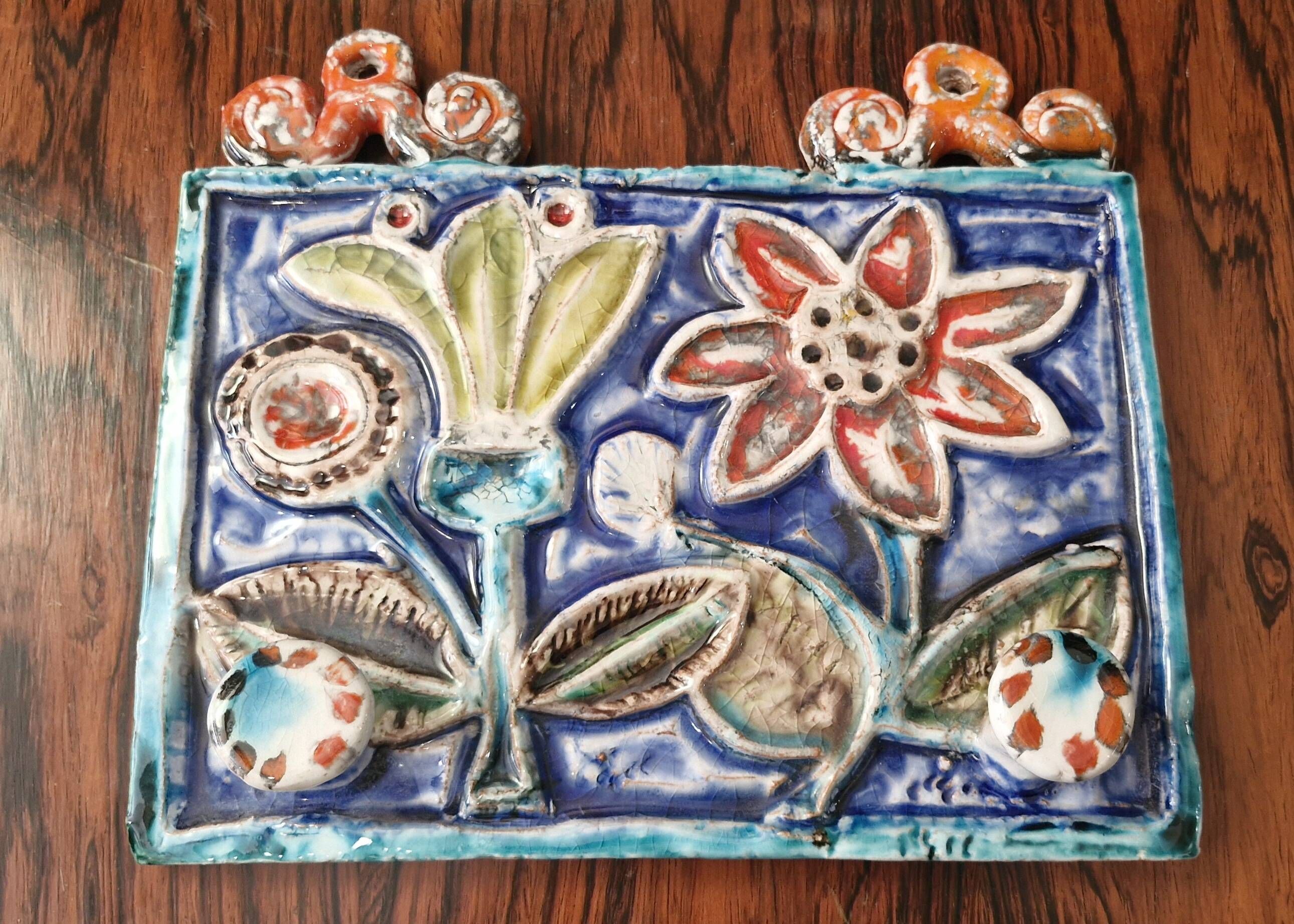 Art ceramic, towel holder with floral decoration signed Giovanni Desimone.