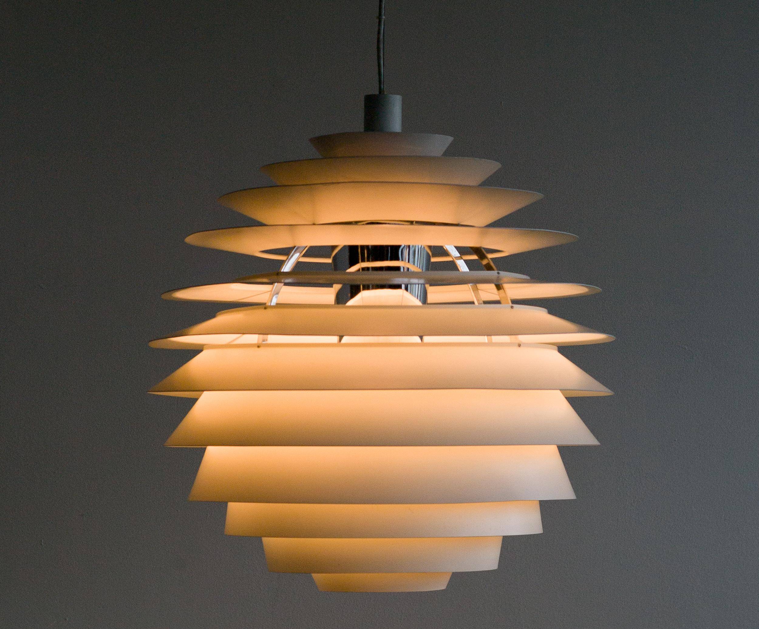 Large pendants from the early last century from the Louvre by Poul Henningsen for Louis Poulsen, 1962.