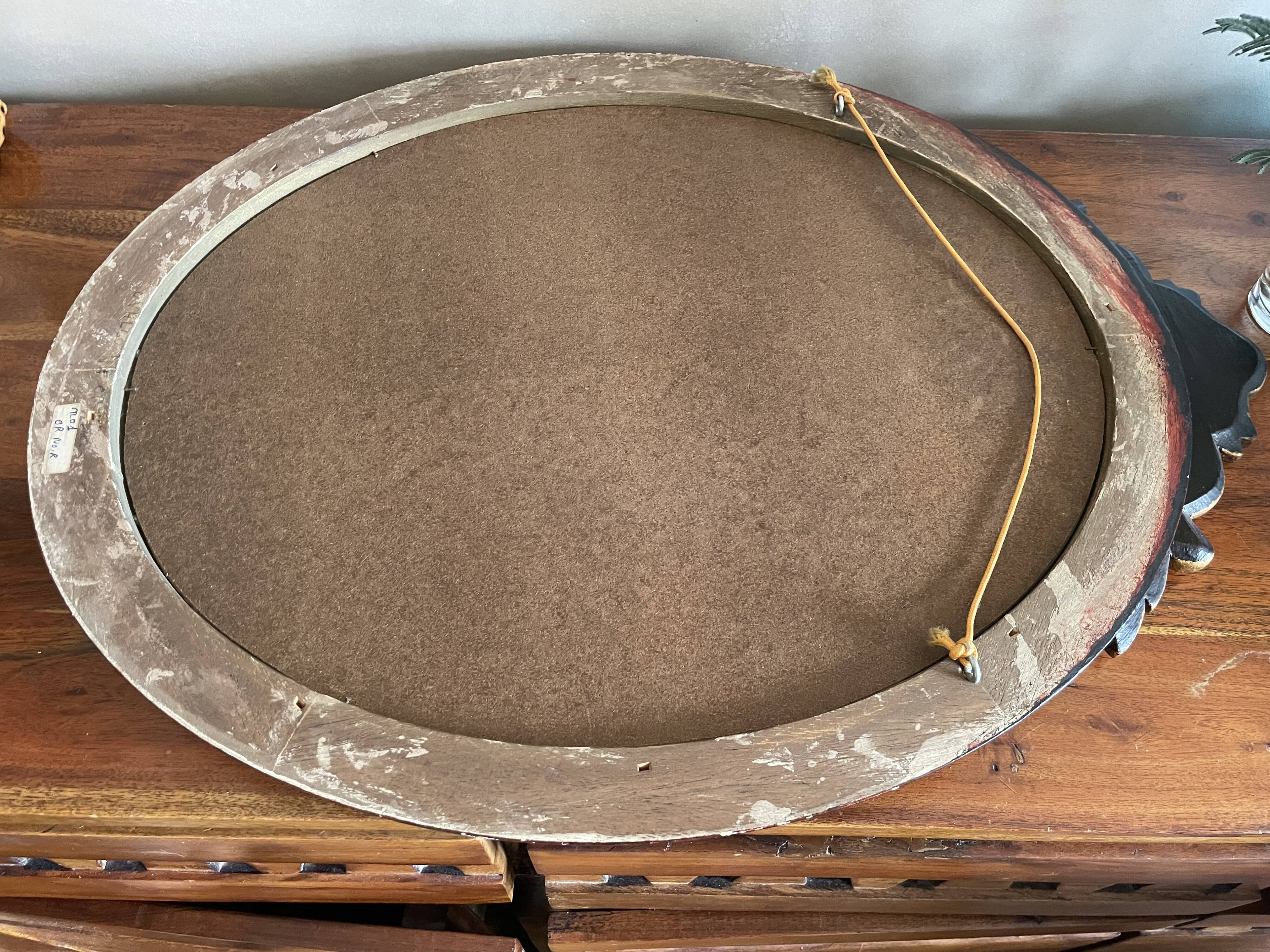 Oval mirror black and gold wood 65x50cm