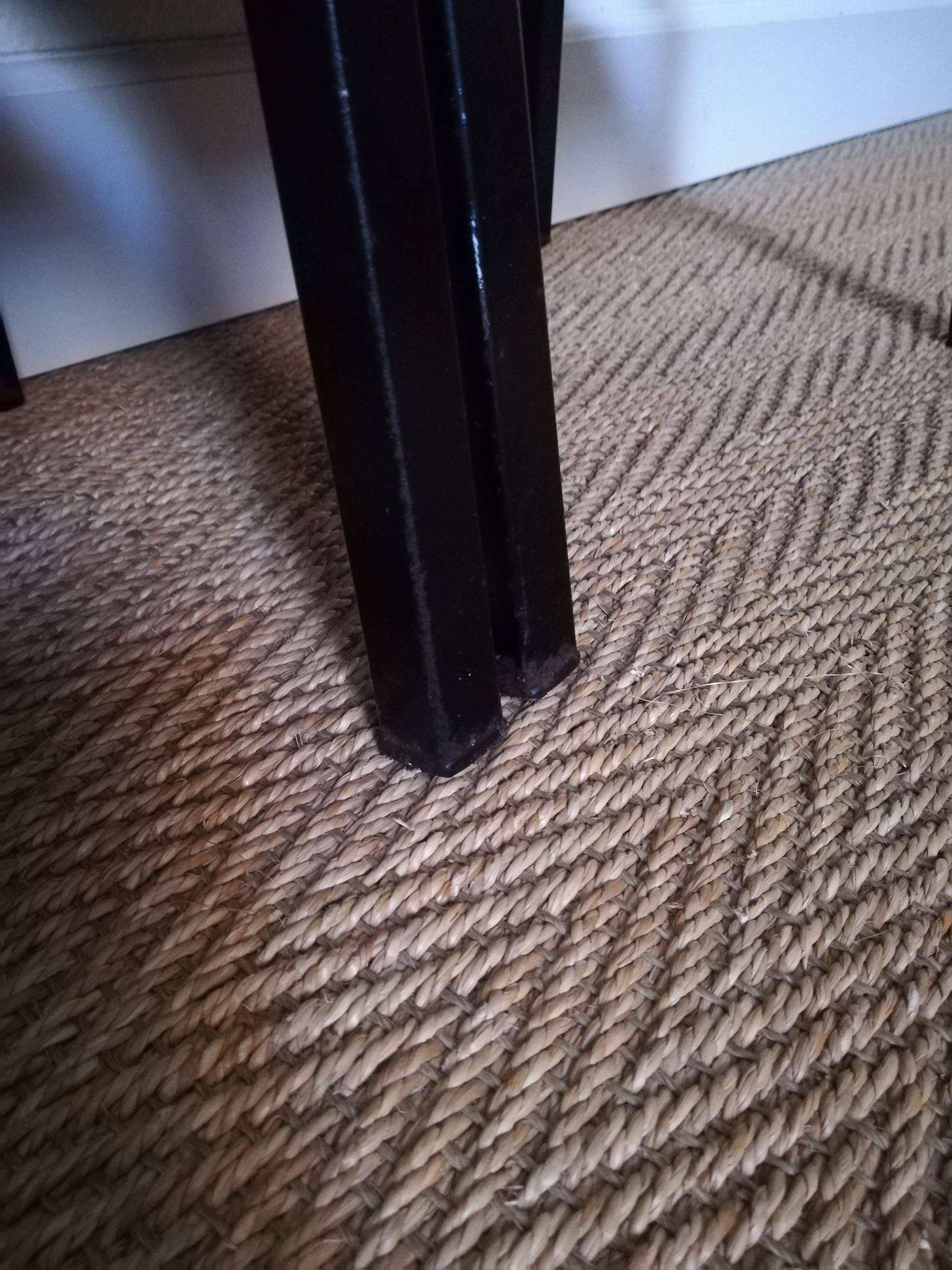 A pair of bedside tables