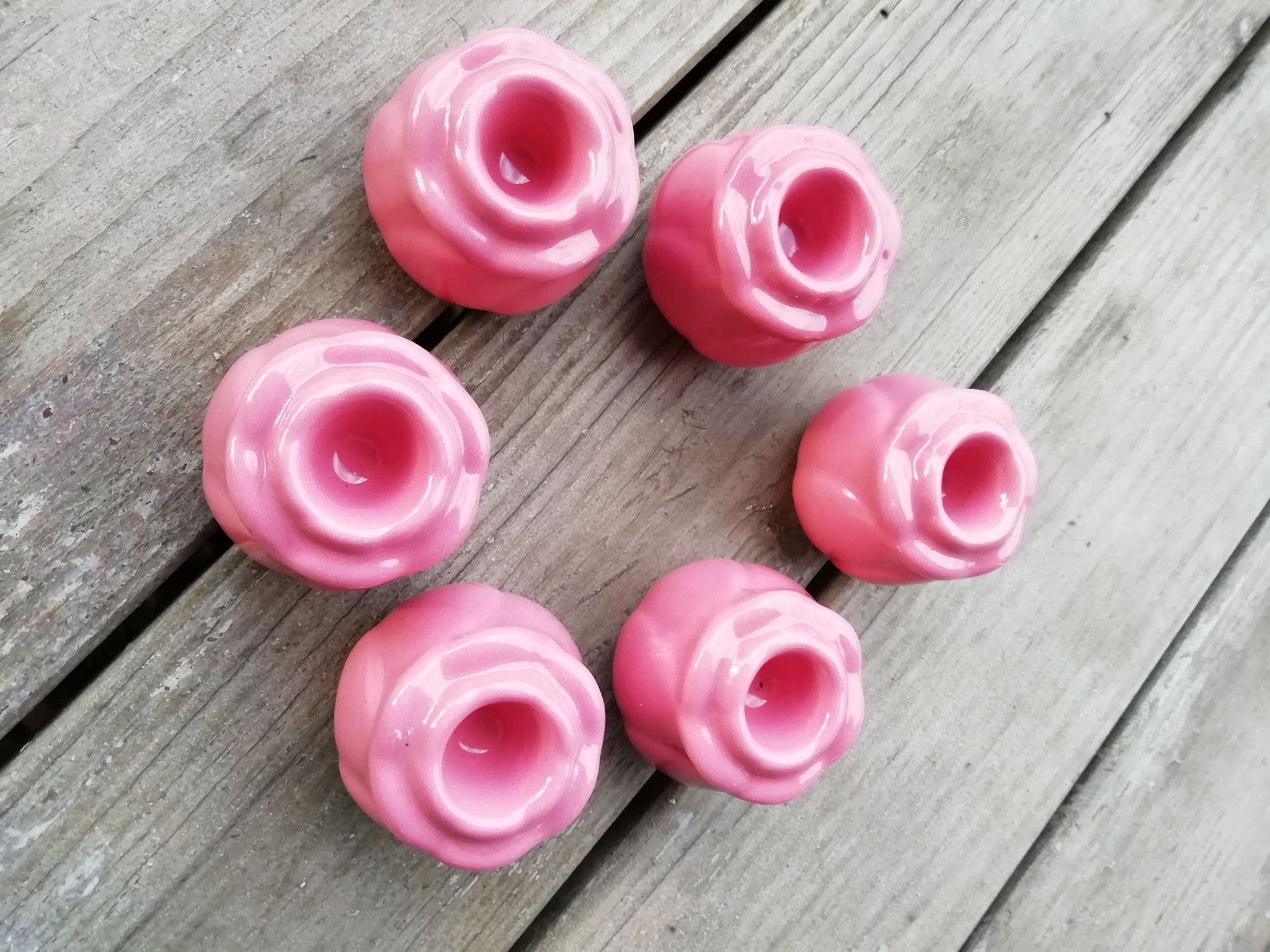 Set of candle holders shaped rosebud