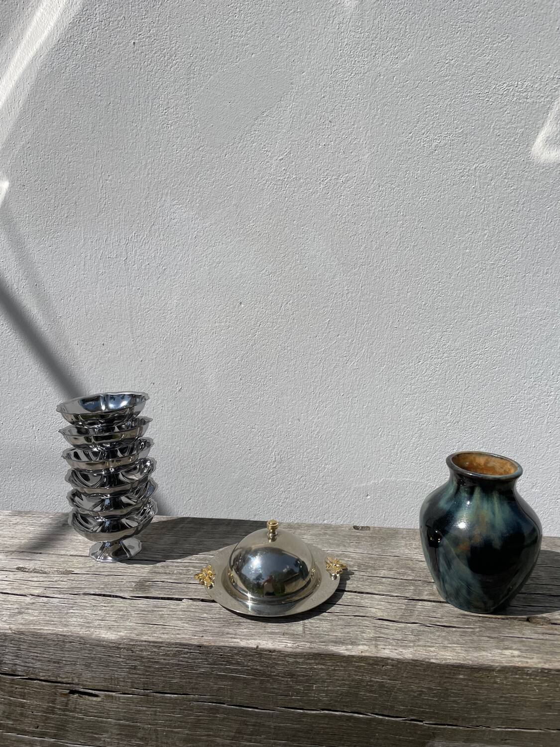 Silver-plated metal butter dish with knots