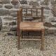 French antique turned wooden bobbin chair with rush seat