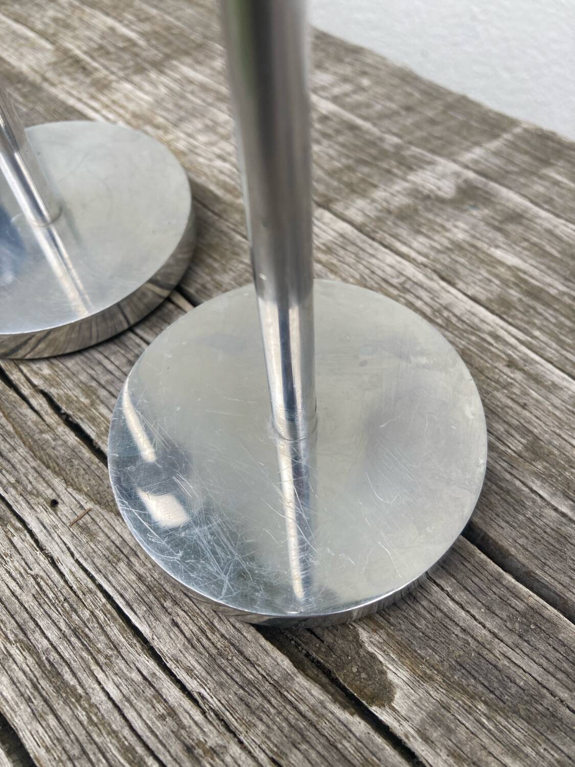 Pair of modernist aluminum candlesticks